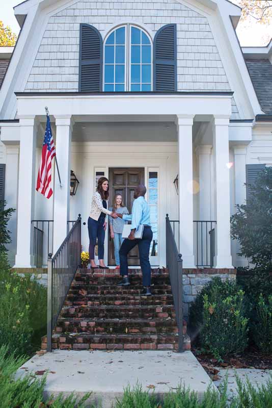 shaking hand on porch